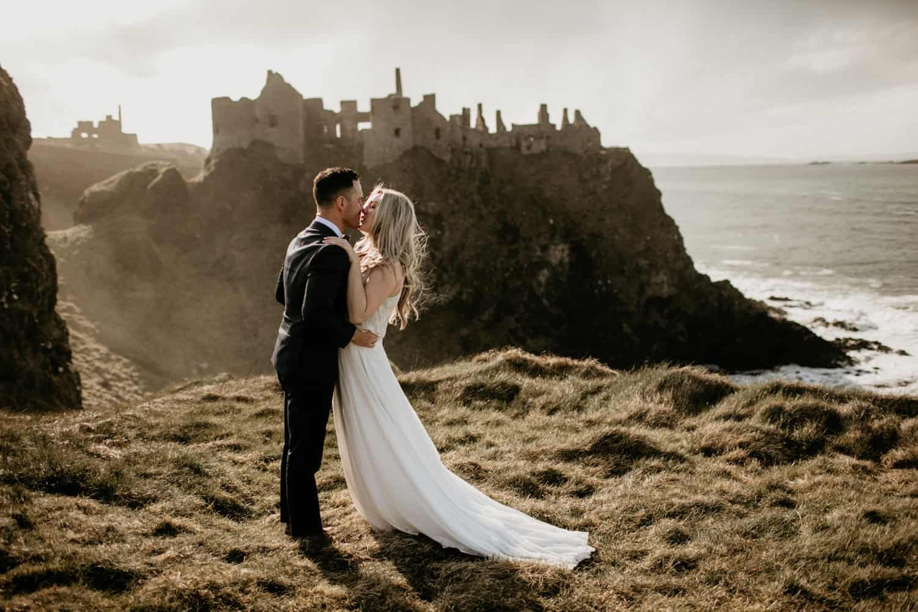 Newlywed Couple with Castle Backdrop